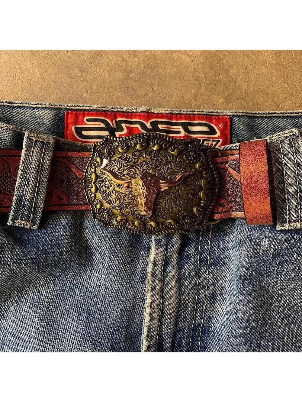 American Western Brown leather belt with silver-toned brass buckle, featuring a